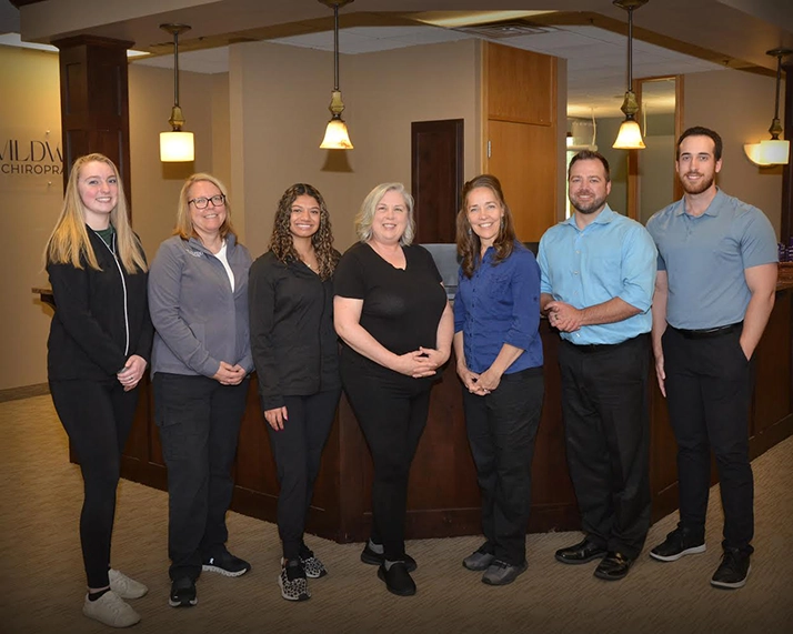 Chiropractor White Bear Lake MN John Mack Heidi Salonek Tyler Depaulis With Team